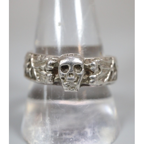 208 - German SS style silver skull ring with various rhunes and motifs  and engraved to the interior.   (B... 