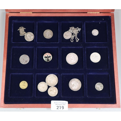 219 - Group of assorted coins and tokens to include: Boer War, Prisoner of War One Shilling coin drilled a... 