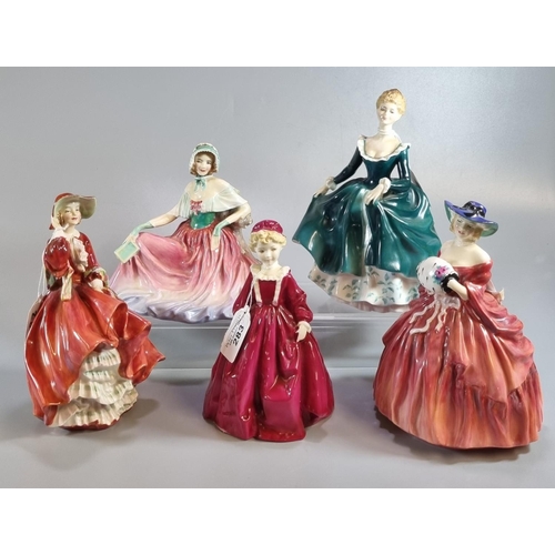 283 - Four Royal Doulton figurines to include: 'Top O'the Hill' HN1834, 'Genevieve' HN1962, 'Janine' HN246... 