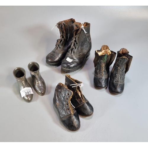 287 - Three pairs of late 19th/early 20th century children's leather  boots. Together with a pair of metal... 