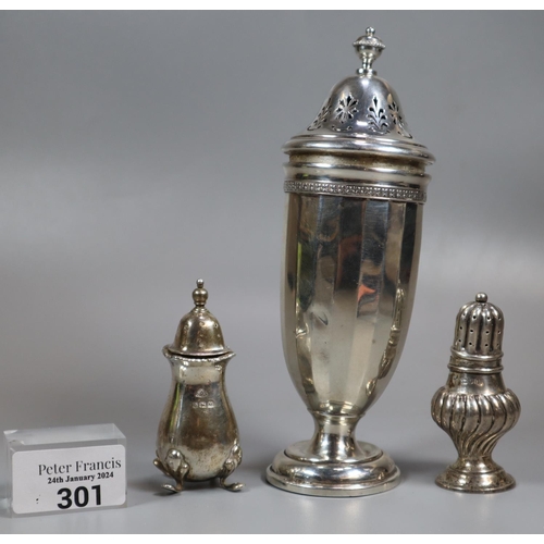 301 - Silver sugar caster together with two silver pepperettes.  6 troy oz approx.  (B.P. 21% + VAT)