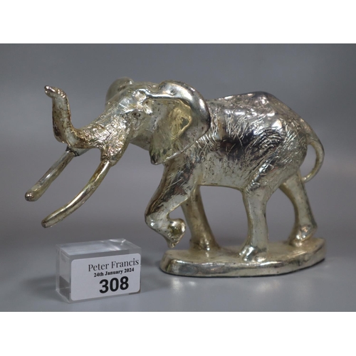 308 - Silver filed  model of an elephant on loaded base.  (B.P. 21% + VAT)