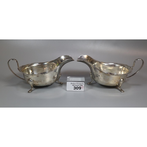 309 - Pair of silver helmet shaped sauce boats, Sheffield hallmarks.  6.4 troy oz approx.  (2)  (B.P. 21% ... 