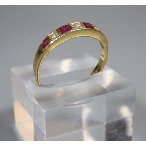 323 - 18ct gold seven stone ruby and diamond half eternity style ring.  2.7g approx.  Size P1/2.  (B.P. 21... 