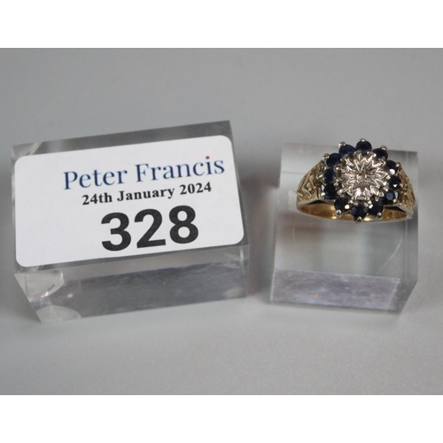 328 - 9ct gold diamond and blue stone cluster ring.  4.7g approx.  Size N1/2.  (B.P. 21% + VAT)