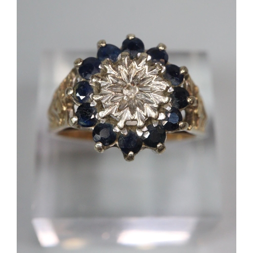 328 - 9ct gold diamond and blue stone cluster ring.  4.7g approx.  Size N1/2.  (B.P. 21% + VAT)