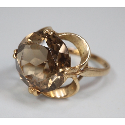 329 - 9ct gold smoky quartz dress ring.  3.2g approx.  Size K1/2.  (B.P. 21% + VAT)