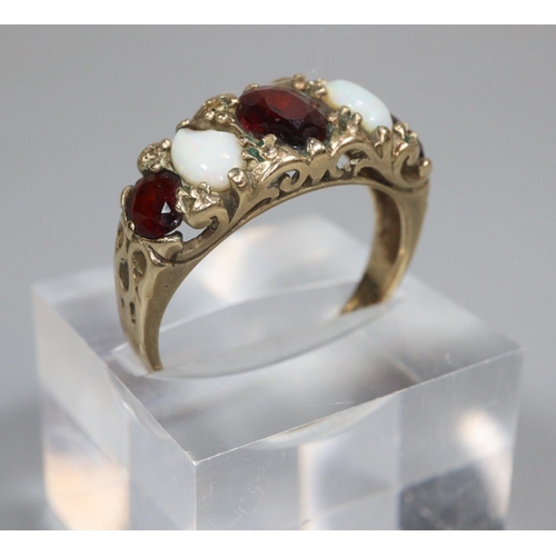 330 - 9ct gold five stone ruby and opal ring.  3g approx.  Size P.   (B.P. 21% + VAT)