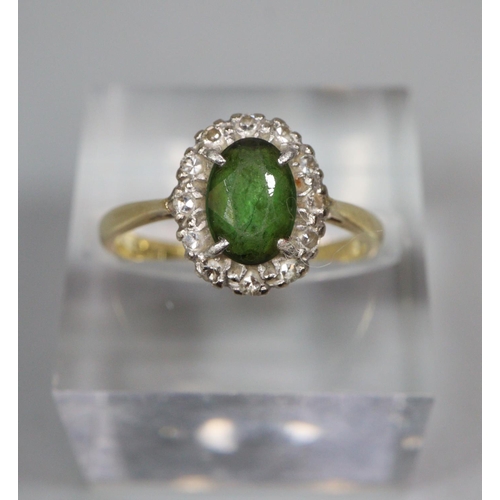 332 - 18ct gold on platinum diamond and green stone ring.  2.9g approx.  Size K1/2.  (B.P. 21% + VAT)