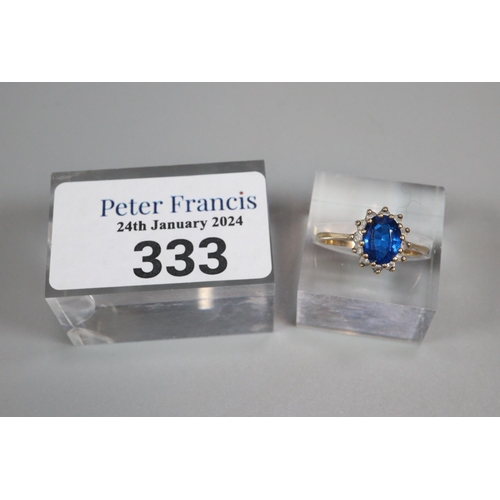 333 - 9ct gold blue and clear stone dress ring.  2.3g approx.  Size N1/2.  (B.P. 21% + VAT)