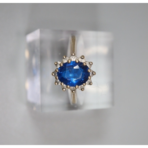 333 - 9ct gold blue and clear stone dress ring.  2.3g approx.  Size N1/2.  (B.P. 21% + VAT)