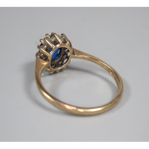 333 - 9ct gold blue and clear stone dress ring.  2.3g approx.  Size N1/2.  (B.P. 21% + VAT)