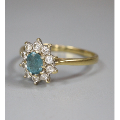 334 - 18ct gold diamond and aquamarine ring.  2.4g approx.  Size Q.  (B.P. 21% + VAT)