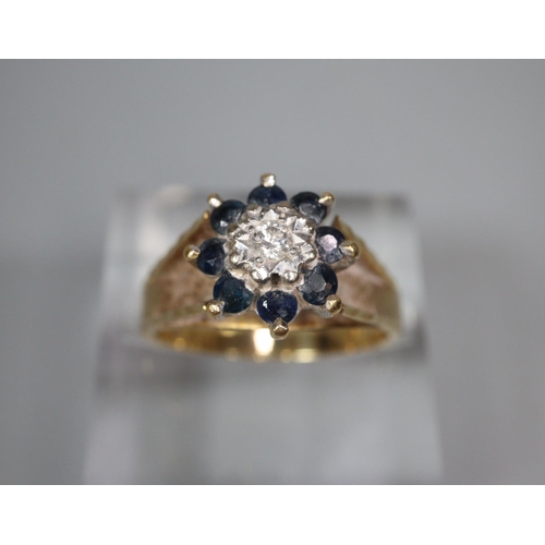 335 - 18ct gold diamond and sapphire ring.  5g approx.  Size K1/2. (B.P. 21% + VAT)