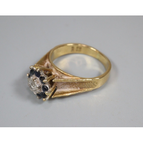 335 - 18ct gold diamond and sapphire ring.  5g approx.  Size K1/2. (B.P. 21% + VAT)