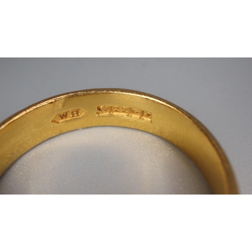 337 - 22ct gold wedding band.  4.3g approx.  Size K.   (B.P. 21% + VAT)