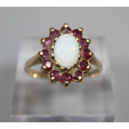 345 - 9ct gold opal and garnet dress ring.  2.9g approx.  Size N.  (B.P. 21% + VAT)