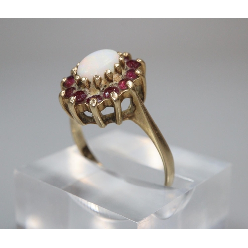 345 - 9ct gold opal and garnet dress ring.  2.9g approx.  Size N.  (B.P. 21% + VAT)