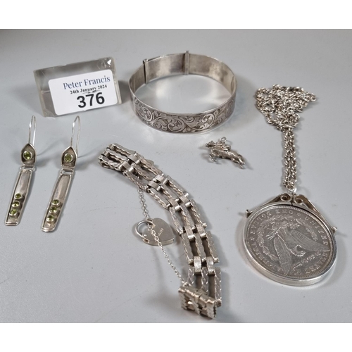 376 - Bag of silver to include: bangle, three bar gate bracelet, USA $1 coin in pendant mount and chain da... 