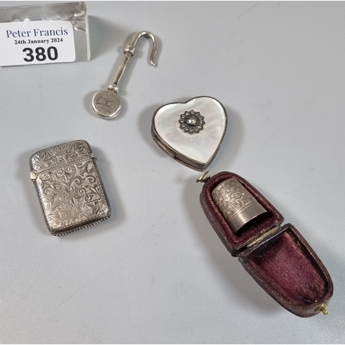 380 - Silver engraved Vesta case together with a silver and mother of pearl heart shaped pill box, silver ... 