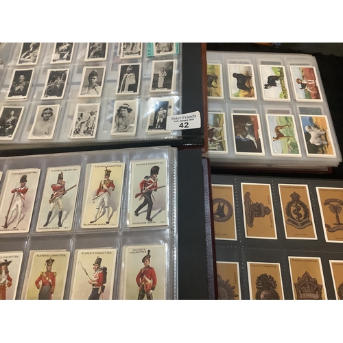 42 - Cigarette cards selection in four boxed albums, Players. Wills, Park Drive, Churchmans etc.  Good ra... 