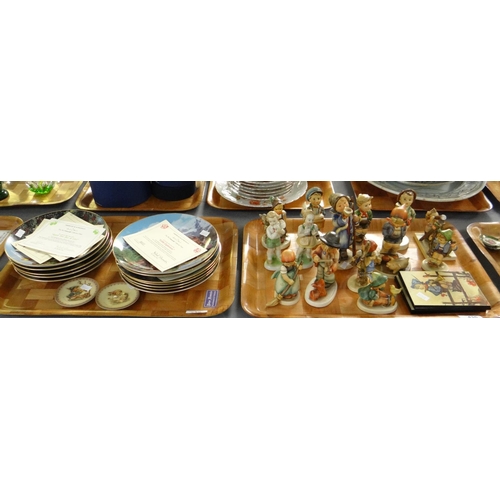 435 - Two trays of West German Goebel Hummel figurines and collectors plates and similar items. (2)
(B.P. ... 