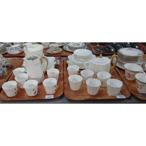 443 - Six trays of china to include: two trays of Spode 'Fleur-de-lis' gold design coffeeware, two trays o... 