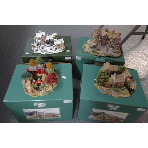 449 - Four large Lilliput lane models to include: 'The King's Arms', 'Homeward Bound for Christmas', 'Blue... 