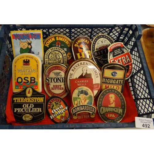 492 - A small crate containing vintage advertising beer pump clips to include: 'Young Tom, Tomos Watkins &... 