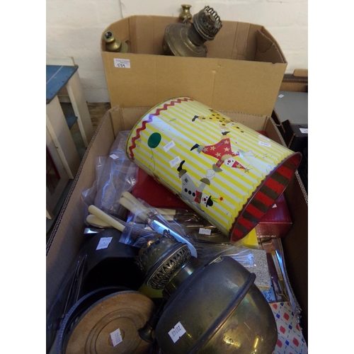 539 - Two boxes of assorted items to include: oil lamps, pewter items, clown bin, flat ware etc.  (2)   (B... 