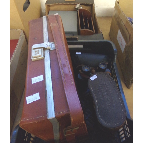 540 - Two boxes of assorted items to include: wooden stationary rack, desk set, binoculars, playing cards ... 