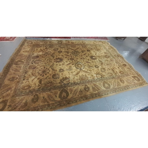 557 - 20th century brown ground floral and foliate carpet.  370x260cm approx.   (B.P. 21% + VAT)