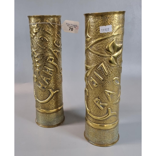 70 - Trench Art - pair of WWI period embossed brass shell cases, decorated with holly leaves and the word... 