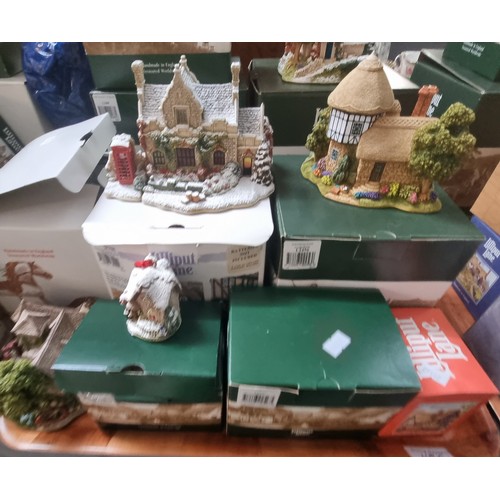 450 - Four trays of twenty six Lilliput Lane landmarks and buildings to include: 'Haberdashery', 'Sea View... 