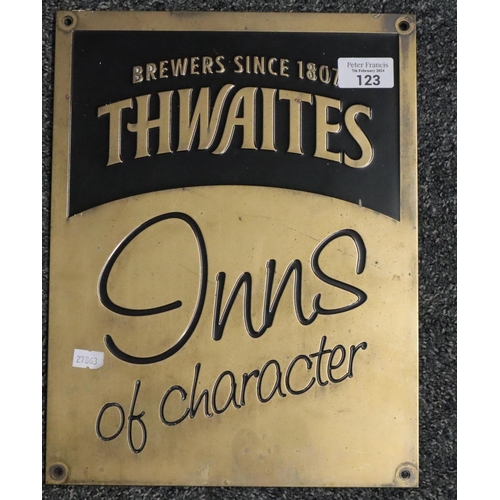 123 - Heavy brass advertising sign, 'Thwaites Inns of Character, Brewers since 1807'.   (B.P. 21% + VAT)