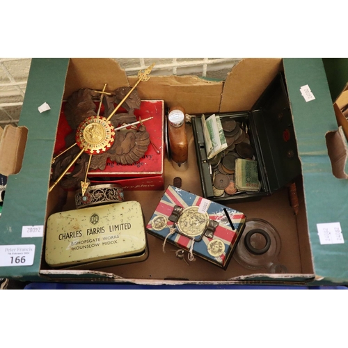 166 - Box of oddments to include: tin moneybox comprising various coinage and bank notes and an Oxo Cubes ... 