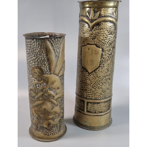 18 - Trench Art - two similar embossed and worked brass shell cases, German  decorated with the figure of... 