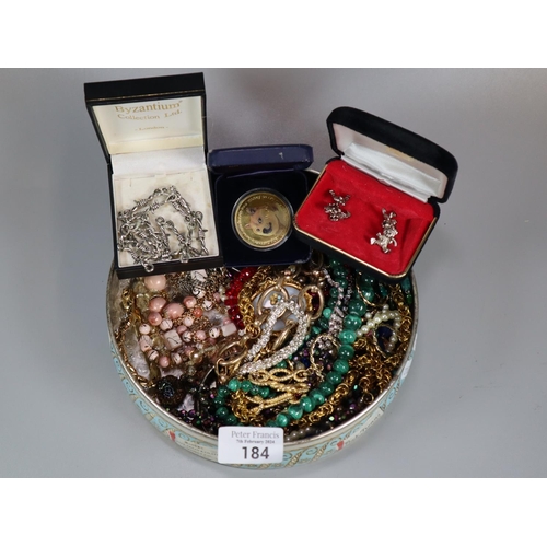 184 - Biscuit tin comprising assorted costume costume jewellery.  (B.P. 21% + VAT)