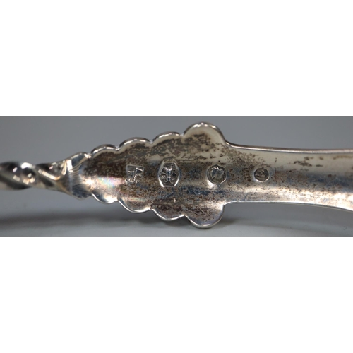 196 - Unusual antique silver toddy ladle with spiral shaft and engraved decoration, indistinct hallmarks. ... 