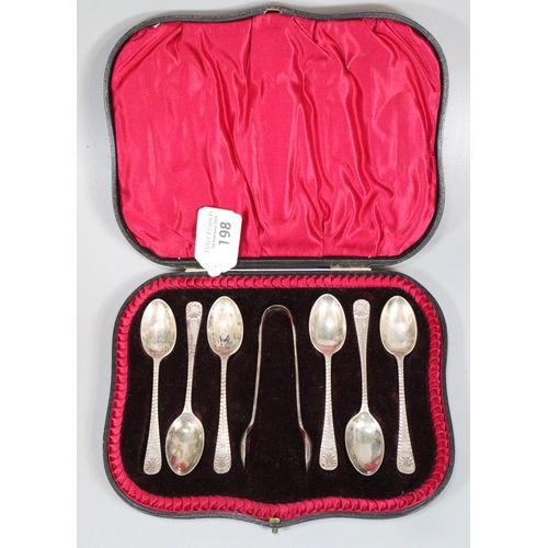 198 - Cased set of cased six silver bright cut teaspoons with sugar nips by Henry Atkin Sheffield.  3.15 t... 