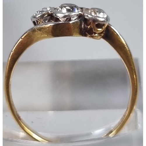 214 - 18ct gold clear three stone ring (not diamonds).  2.1g approx.  Size L1/2.  (B.P. 21% + VAT)