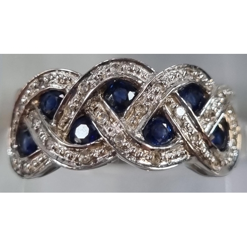 218 - Modern 9ct white gold blue and clear stone dress ring.  3.5g approx.  Size N.  With Gem TV Promise c... 