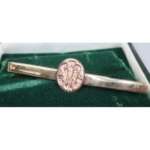 230 - 9ct gold Cymru three feather tie pin, in original box.  4.8g approx.  (B.P. 21% + VAT)