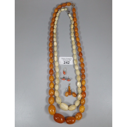 242 - Art Deco design amber graduated necklace.  68.7g approx.  Together with pair of amber earrings, ambe... 