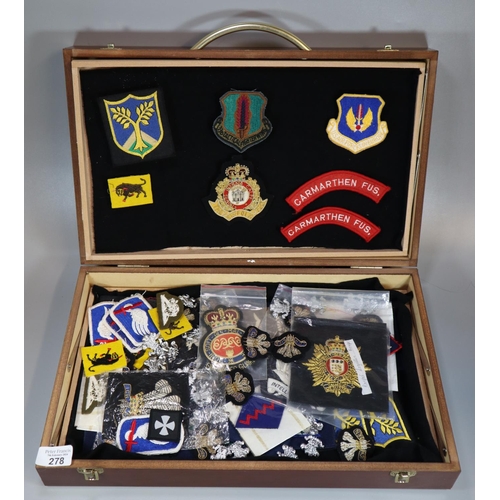 278 - Collection of assorted military patches, blazer badges and cap badges, including: US Air Forces in E... 