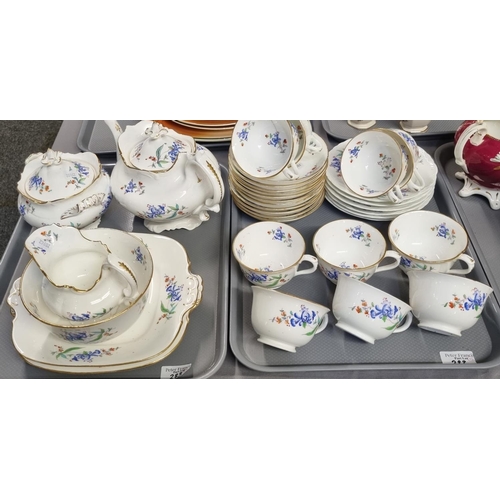 283 - Four trays of 19th century tea ware, overall decorated on white and burgundy grounds with flowers an... 