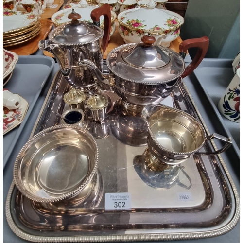 302 - Walker and Hall, a silver plated five piece tea service including tray together with a silver condim... 