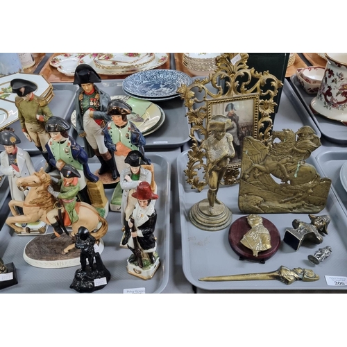 306 - Four trays of military related items to include: Continental soldiers, collection of Napoleon items ... 