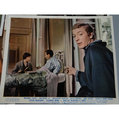 320 - A collection of UK Cinema Front of House film stills/lobby cards with films starring Michael Caine a... 