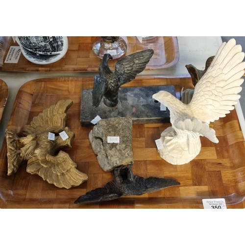 350 - Two trays of animal figurines, various materials to include: eagles on plinths, male lions, gilded b... 